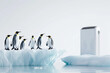 © Alexandra - Group of penguins is standing on a melting iceberg looking at an air conditioner, in a surreal ironic scene