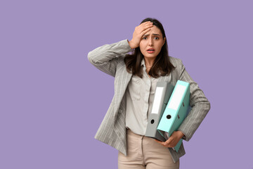 Sticker - Shocked young businesswoman with folders on lilac background