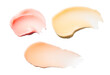 © tatyanarow - Lip balm (or make up cleansing oil butter balm washer) assortment set swatches multi colored orange yellow and pink isolated on white