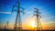 © Sujid - Two tall electricity pylons standing against a clear sky, energy, power, lines, technology, structure, metal