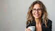 © cvetikmart - Mid-aged businesswoman with glasses smiling and holding coffee cup. Happy mid aged business woman