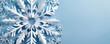 © AI_images_for_people - A cut-out paper banner in the shape of a snowflake, with detailed cutouts, layered over a cool blue background, creating a wintery feel.