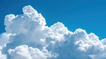 Fluffy white clouds against a deep blue sky, evoking a sense of freedom and peace, with ample copy space for text