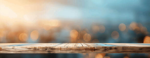 Wall Mural - Wooden Table Top on Light Blue and Brown Blurred Background for Product Display with Natural Lighting