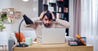 © ihorvsn - Portrait of Arabic male with head in hands sitting in front of laptop screen. Bearded face man is shocked because of glitches in app.