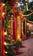 © Nadin Faust - red and gold Indian wedding ceremony decor with hanging lights, garlands, flowers, green plants, traditional motifs, outdoors under night lights, joyous energy