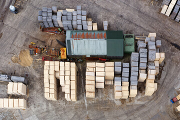 Wall Mural - Sawmill with chopped wood logs stacked and machinery