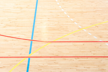 Wall Mural - Wooden floor basketball, badminton, futsal, handball, volleyball, football, soccer court. Wooden floor of sports hall with marking lines on wooden floor indoor, gym court