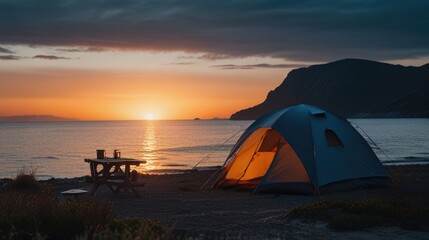 camping by the sea at sunset