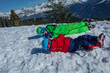 © Sergey Novikov - Kids have fun to roll down the snowy slope in mountains