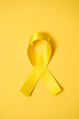 Yellow ribbon, symbol of the world suicide prevention day, or child cancer. September 10th.