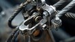 © Justlight - A macro shot of the parking brake cable displaying the intricate inner workings and mechanics of the system.