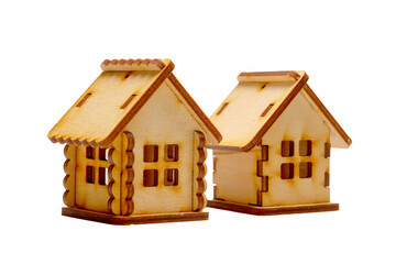 Two wooden models of houses on a white background. Isolated. Close up.