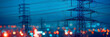 © john - high-voltage tower and power lines with abstract defocused city lights at night, transmission of electricity for urban life