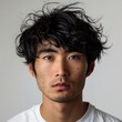 © siripimon2525 - Japanese man with messy textured hair, wearing a casual t-shirt, looking relaxed, Portrait half-body, hyper-realistic, high detail, photorealistic, white background, studio lighting, Key Light, Fill
