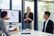 © peopleimages.com - Business, woman and presentation in office with statistics for strategy, planning and pitch. People, employees and smile at boardroom for teamwork or collaboration on report and review with graphs