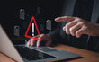 © BritCats Studio - Close up shot of people point to access to personal data and document with warning sign as concept of data breach or attack from hacker or spyware. Data security concept.