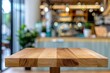 © Sudipta - Empty wooden table space platform and blurturquoise resturant or coffee shop background for product display montage
