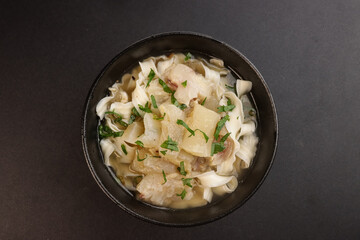 Wall Mural - Beef Tendon Noodle Soup in a Bowl.