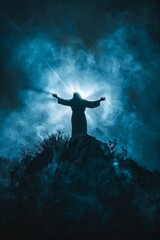 Wall Mural - Prophet on a mountain top with arms raised in prayer as light filters through smoke and clouds, creating a silhouette