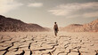 © TarikTalha - Landscape of Cracked earth metaphor climate change and global warming concept.