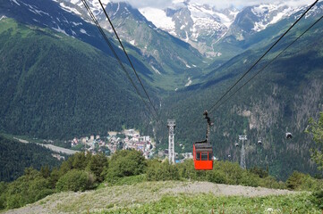 Wall Mural - Top view of the dombay and the lift with a horse-drawn road. Caucasus.