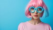 © Trushchenko_O - A woman with blue and pink hairA woman with blue and pink hair and glasses is standing in front of a blue background. She has a bright and cheerful look on her face