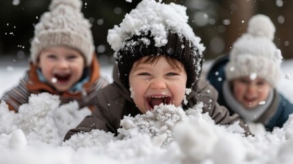 Three joyful children playing enthusiastically in the snow, dressed in warm winter clothing and laughing. The image captures the essence of childhood fun and winter excitement.