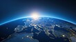 © CALMANDRELAX STUDIO - view of Earth from space at sunrise, showcasing illuminated cities and the curvature of the planet. Ideal for global themes and science topics.