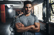 © peopleimages.com - Man, portrait and confident in gym for fitness, bodybuilding and personal training for health or muscle strength. Male person, arms crossed and proud for active living, exercise and cardio workout.
