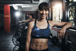 © peopleimages.com - Woman, portrait and happy in gym for fitness, bodybuilding and personal training for health or muscle strength. Female person, confident and proud for active living, exercise and cardio workout.