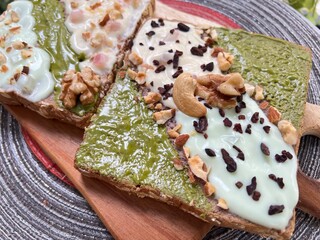 Matcha almonds butter toast with yoghurt and almonds mixed cacao nibs