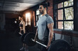 © peopleimages.com - Man, team and workout with barbell in gym for deadlift, muscle and wellness of healthy body. Fitness, exercise and strong woman weightlifting for power, bodybuilding and training together at club