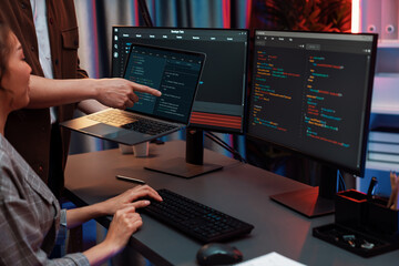 serious of it developers discussing intelligent website development coder system running data online