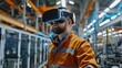 © Patcharaphorn - Engineer in VR headset simulating a new factory layout