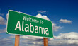 © Andy Dean - Welcome To Alabama Green Road Sign Over Blue Sky with Some Clouds.