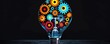 © Usama - Light bulb with vibrant gears and tools, black backdrop, business planning idea, clean and sleek design.