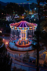 Wall Mural - View of the lights from the amusement park at night.