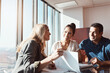 © ReeseArcurs/peopleimages.com - Success, financial advisor or couple at table in meeting for insurance, review and paper for profit. Female broker, consult or plan with people for investment, contract update or discussion in office