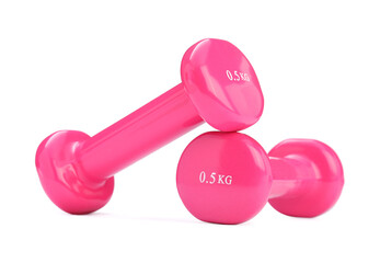 Pink dumbbells isolated on white. Sports equipment