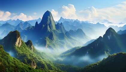 Wall Mural - Tall, jagged mountains draped in lush greenery, with mist gently rolling through the valleys