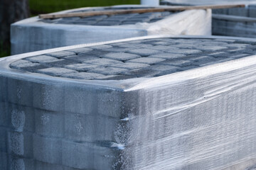 Stack of concrete blocks on construction site, closeup.