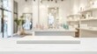 © Anzhela - Empty white marble board on tabletop on blurred spa salon background for display your product