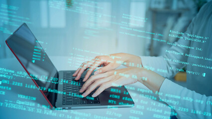 A woman using computer in office and digital technology concept.