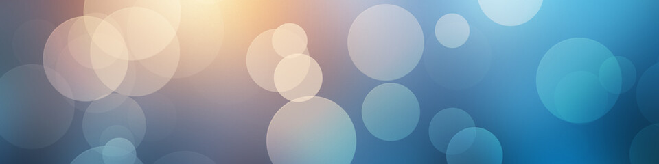 Wall Mural - A bokeh blur background in blue with circles. 