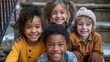 © CoolGraphics - Happy mixed race school kids sitting together on staircase