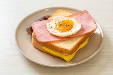 Poster - bread toasted cheese topped ham and fried egg with pork sausage