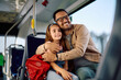 © Drazen - Happy father embracing his daughter while riding in  bus.