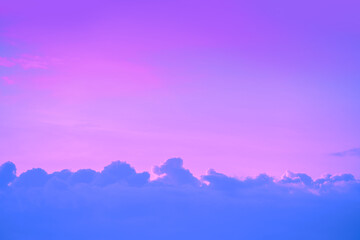 Wall Mural - Purple cloudy sky at sunset. Gradient color. Sky texture. Abstract nature background