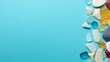 © Anastasiya - summer banner. A collection of colorful, smooth sea glass pieces arranged on a light blue background. soft focus .  copy space